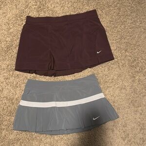 2 Nike size L tennis skirts